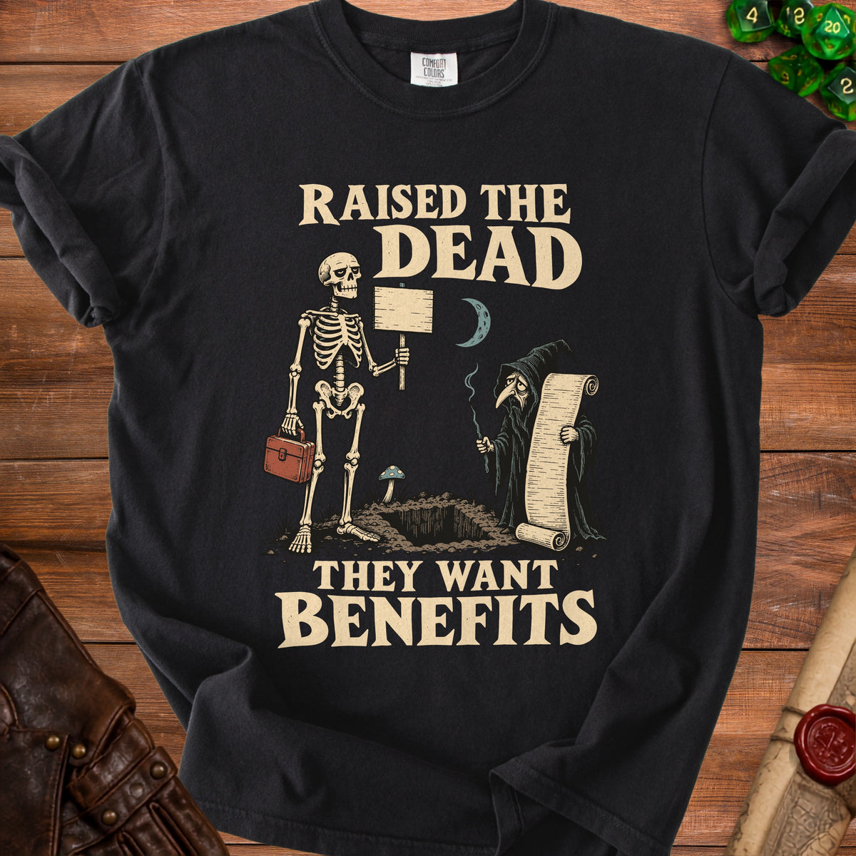 Skeleton holding sign, grim reaper with scroll, "Raised the Dead They Want Benefits" text.