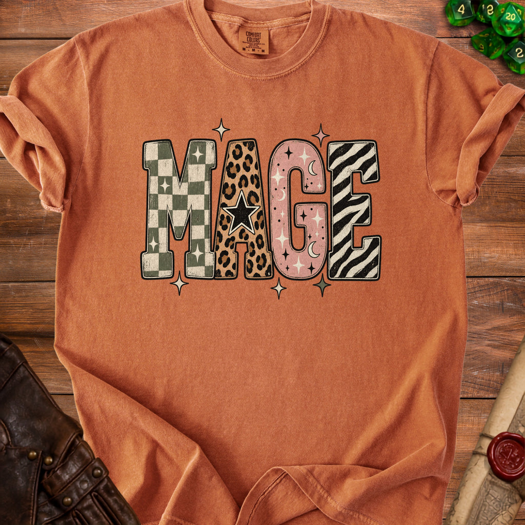 Orange t-shirt with "MAGE" in patterned letters and stars.