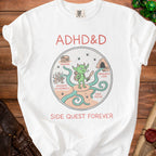 White t-shirt with "ADHD&D" and a circular graphic of a goblin with side quests.