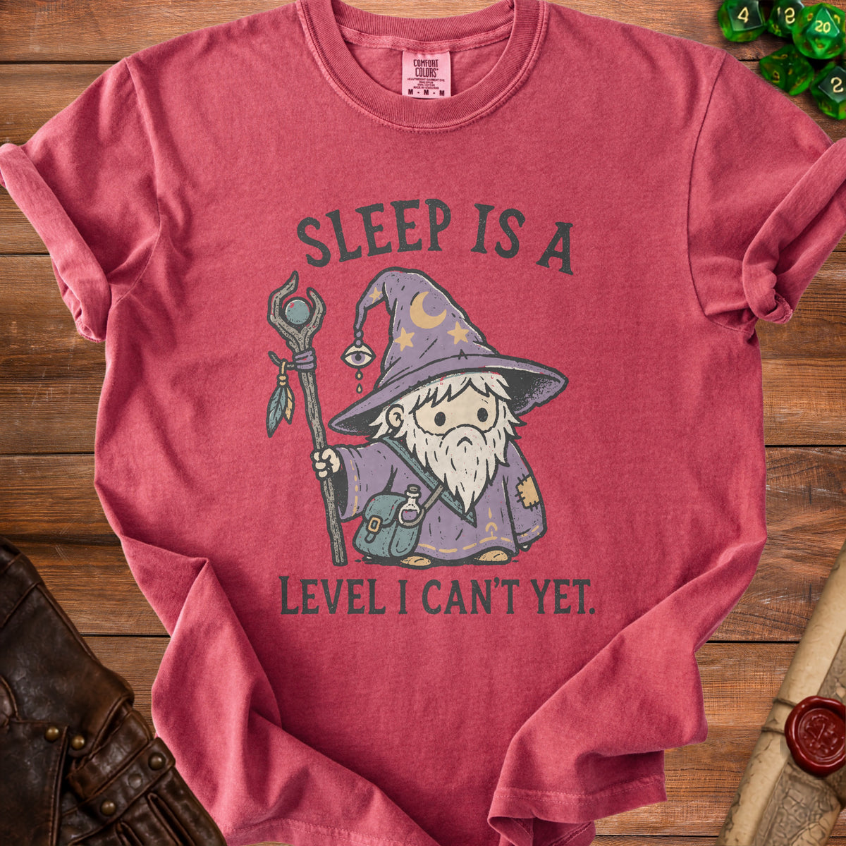 Red t-shirt with wizard graphic and text "Sleep is a level I can't yet."