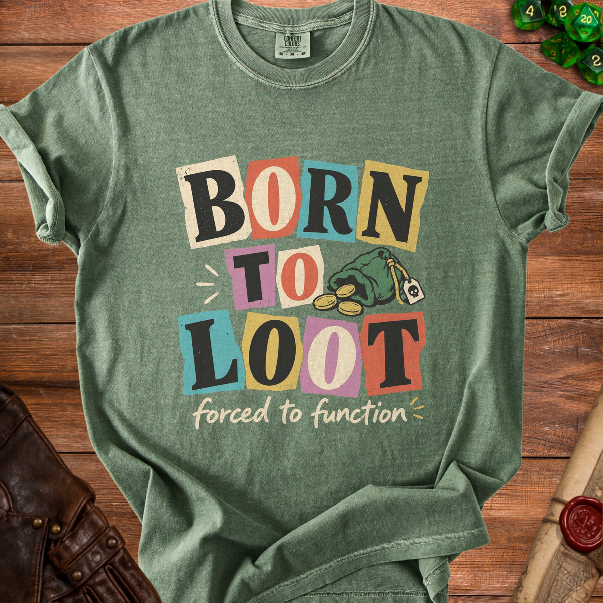 Green t-shirt with "BORN TO LOOT forced to function" text and a money bag graphic.