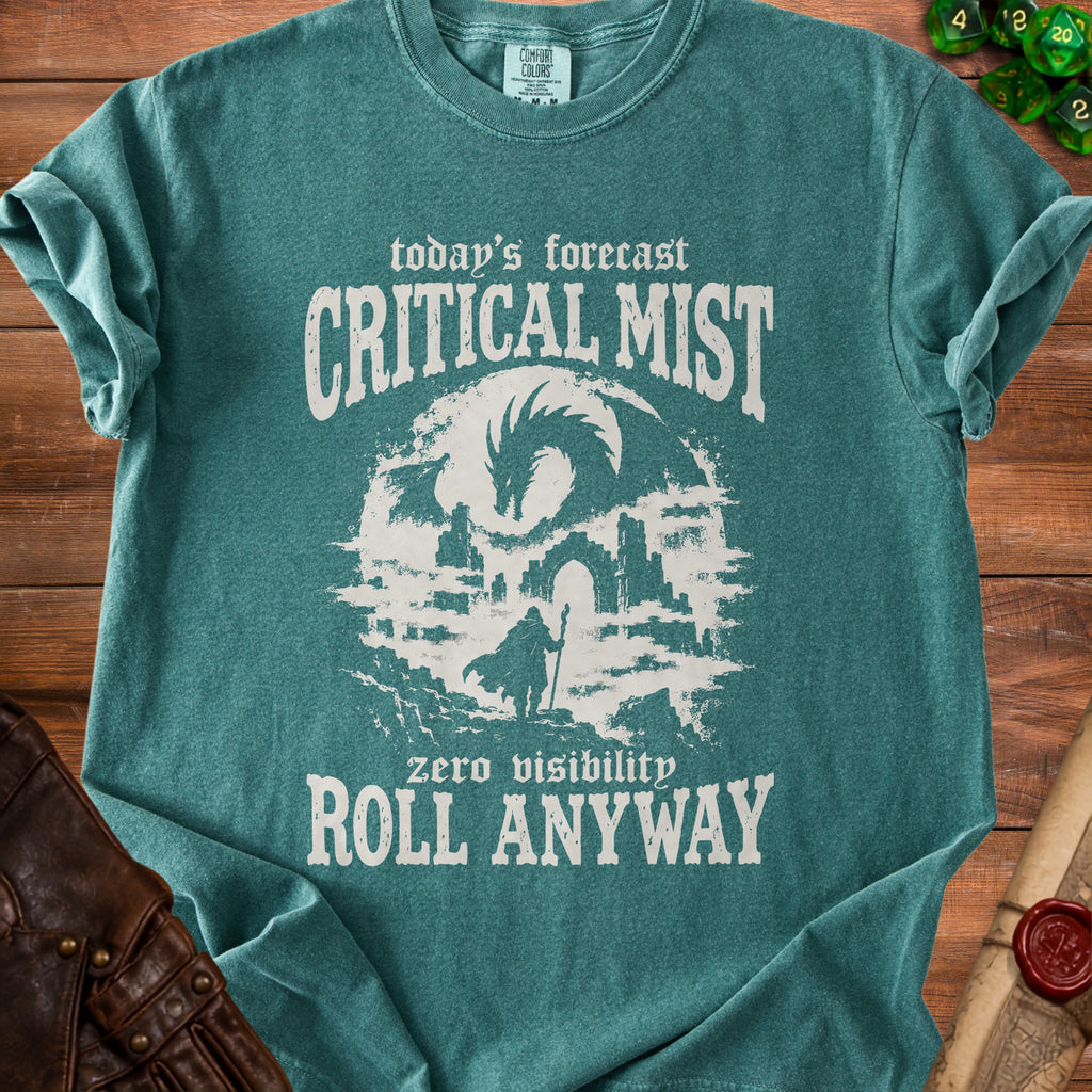 Teal t-shirt with "today's forecast CRITICAL MIST zero visibility ROLL ANYWAY" text and dragon art.