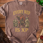 Brown t-shirt with dragon, dwarf, and wizard lifting weights, text "EVERY REP IS XP".