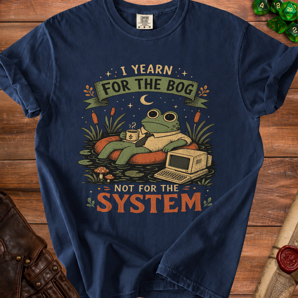 Frog wearing shirt and tie, holding coffee, sits in bog next to computer. Text: I yearn for the bog, not for the system.