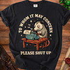 Black t-shirt with possum at typewriter saying "THNX PLS SFU" and "PLEASE SHUT UP".