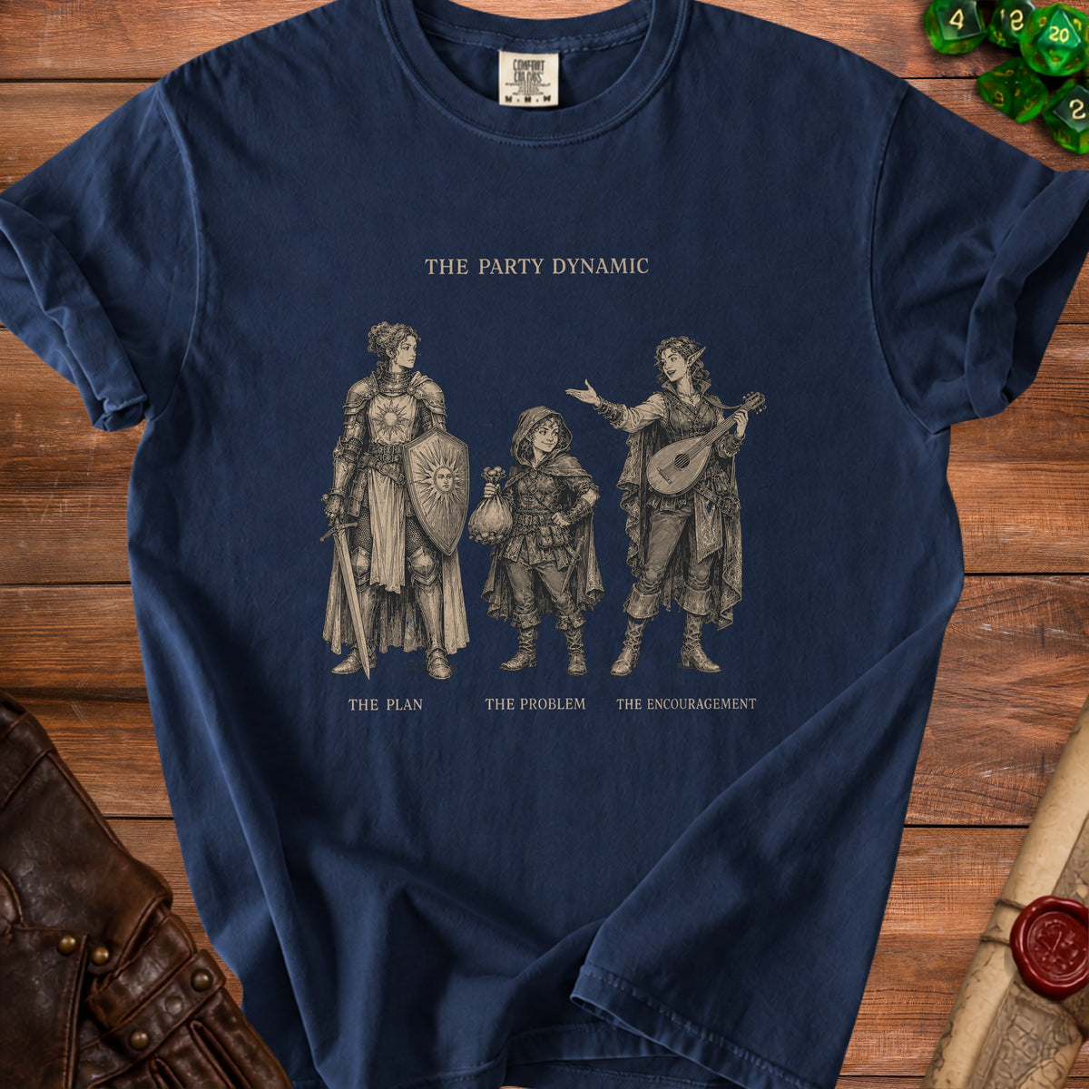 T-shirt with "The Party Dynamic" featuring three fantasy characters labeled The Plan, The Problem, The Encouragement.