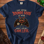 Navy t-shirt with moth graphic and text "Love saying 'Sounds Good' at work when I couldn't care less."