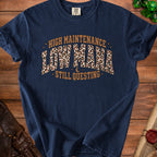 Navy t-shirt with "High Maintenance Low Mana Still Questing" text and leopard print accents.