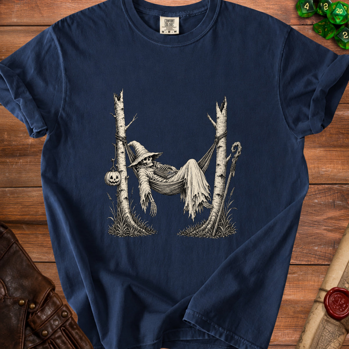 Skeleton in wizard hat relaxes in hammock between two trees, with pumpkin and staff.