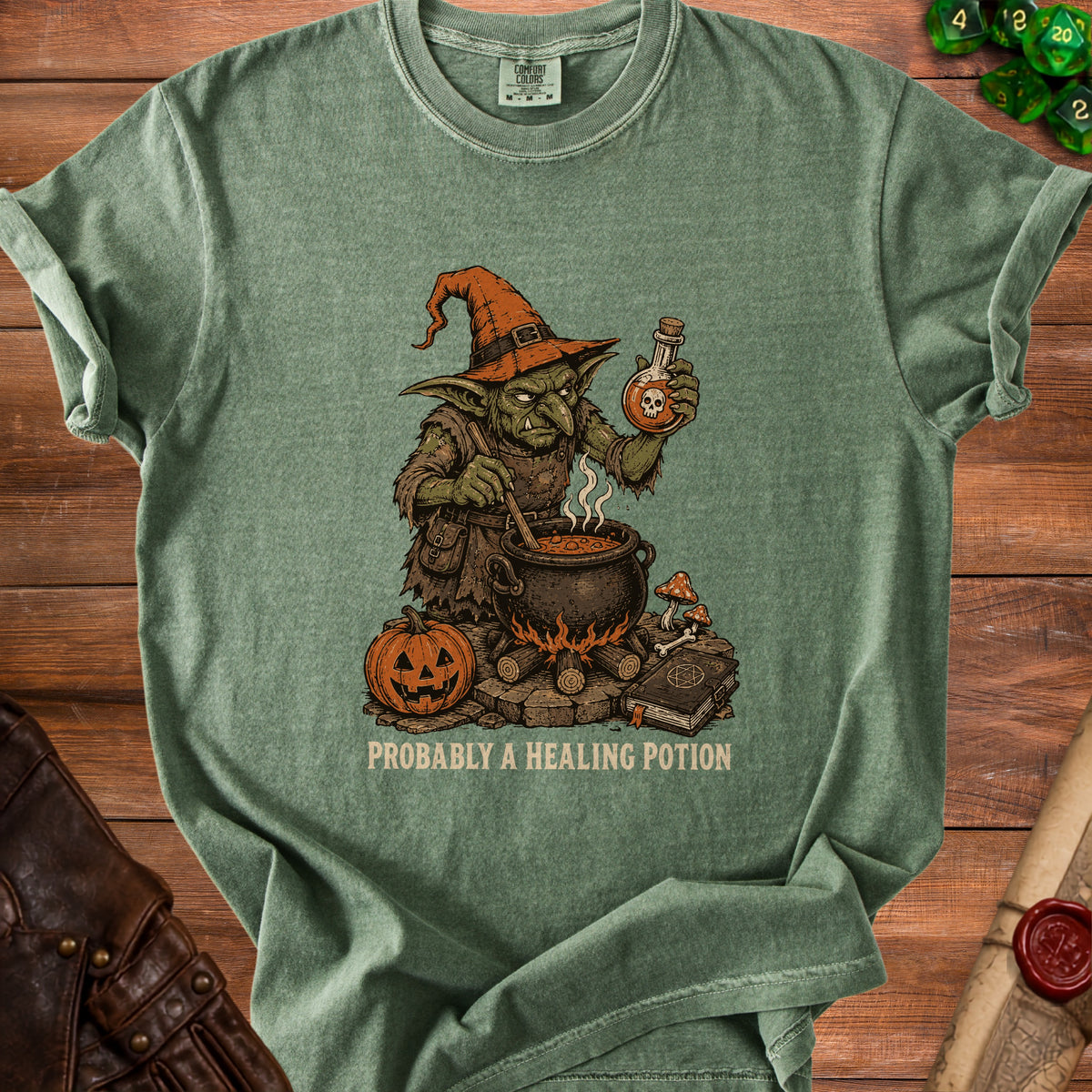 Green t-shirt with a goblin brewing a potion and text "PROBABLY A HEALING POTION".