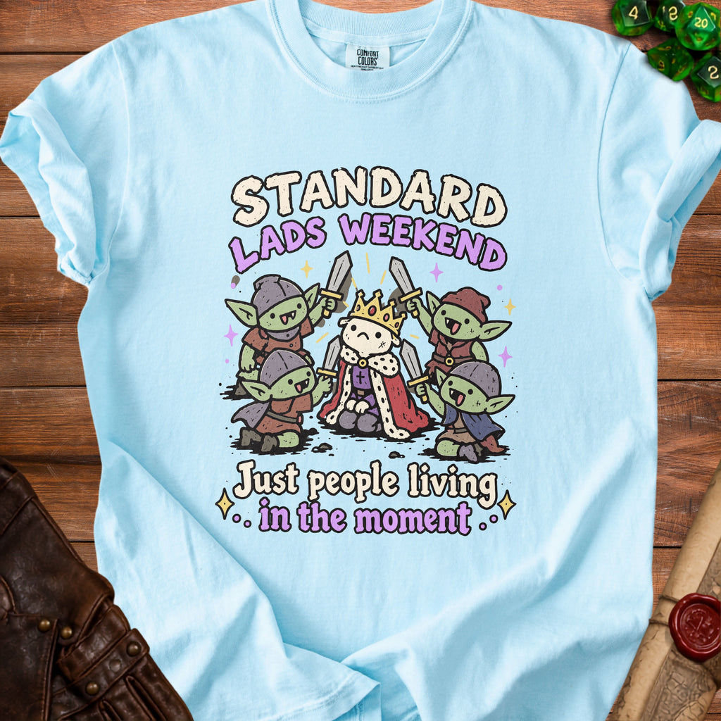 Light blue t-shirt with "Standard Lads Weekend" and goblins.