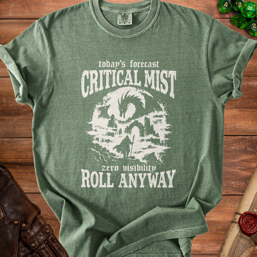 Green t-shirt with "today's forecast CRITICAL MIST zero visibility ROLL ANYWAY" graphic.