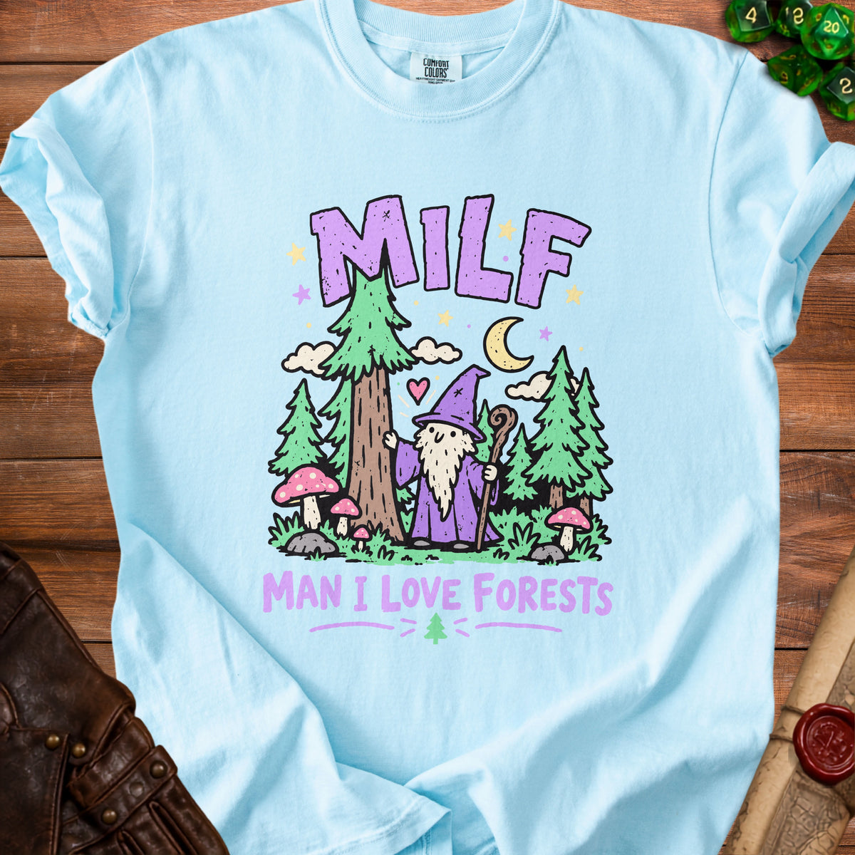 Light blue t-shirt with "MILF MAN I LOVE FORESTS" and a forest gnome graphic.