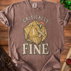 Brown t-shirt with a graphic of a cracked D20 die, mushrooms, and the text "CRITICALLY FINE".