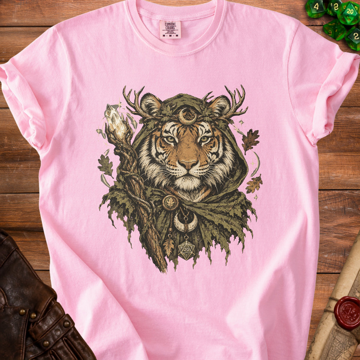 Pink t-shirt with tiger wearing antlers, cloak, and holding a crystal staff.