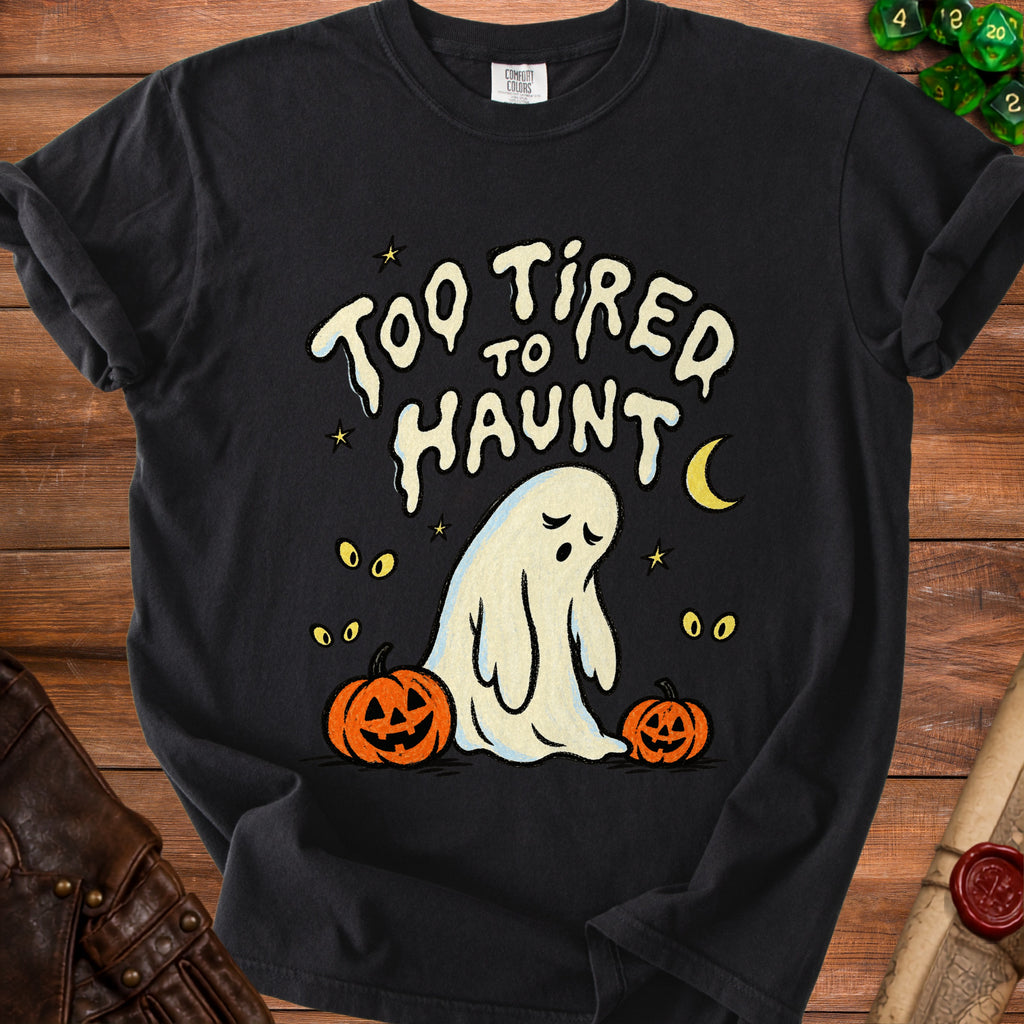 Black t-shirt with a ghost, pumpkins, and text reading "Too Tired to Haunt".