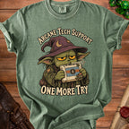 Green t-shirt with cartoon character and text "Arcane Tech Support One More Try".
