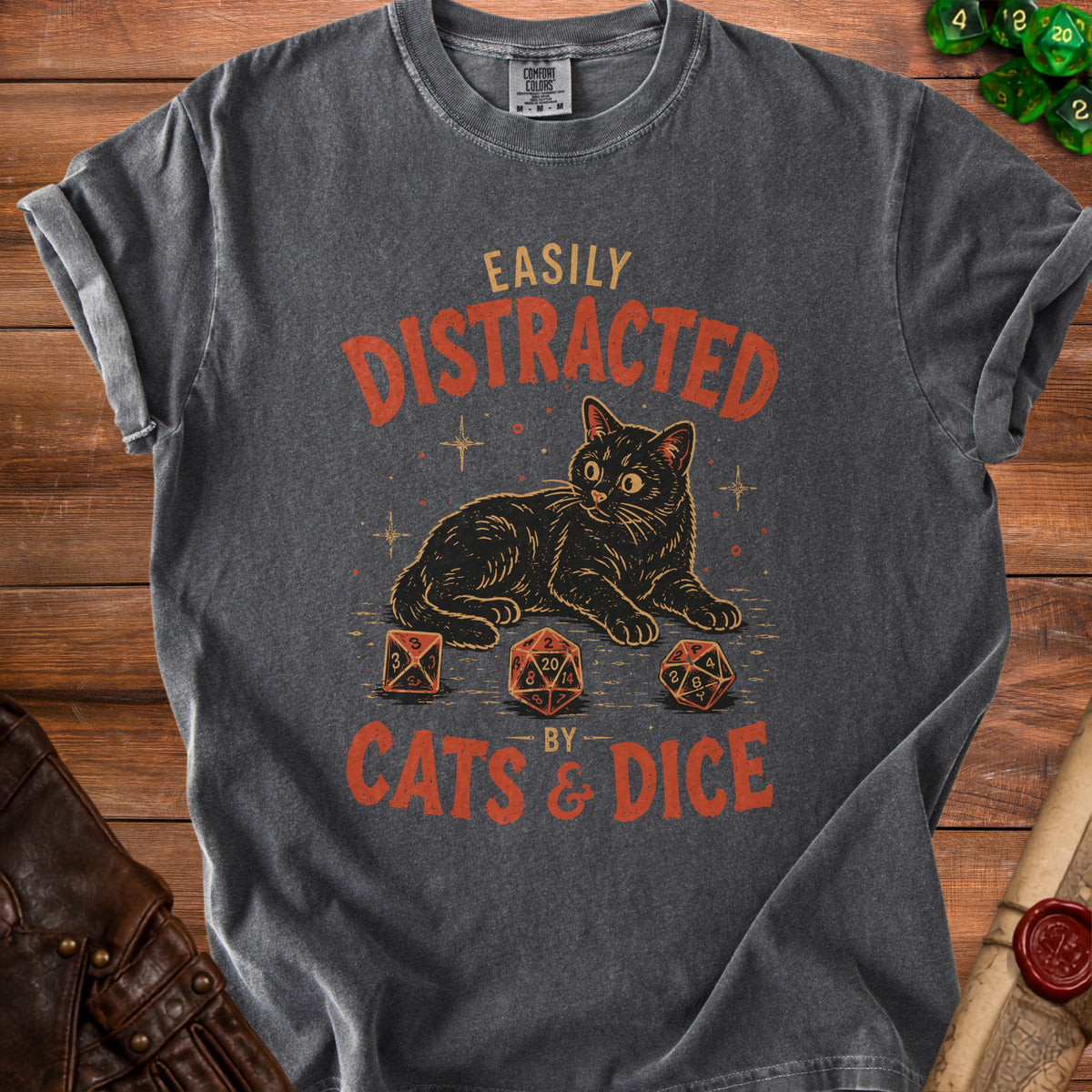 Charcoal t-shirt with a black cat and dice, reads "Easily Distracted By Cats & Dice."