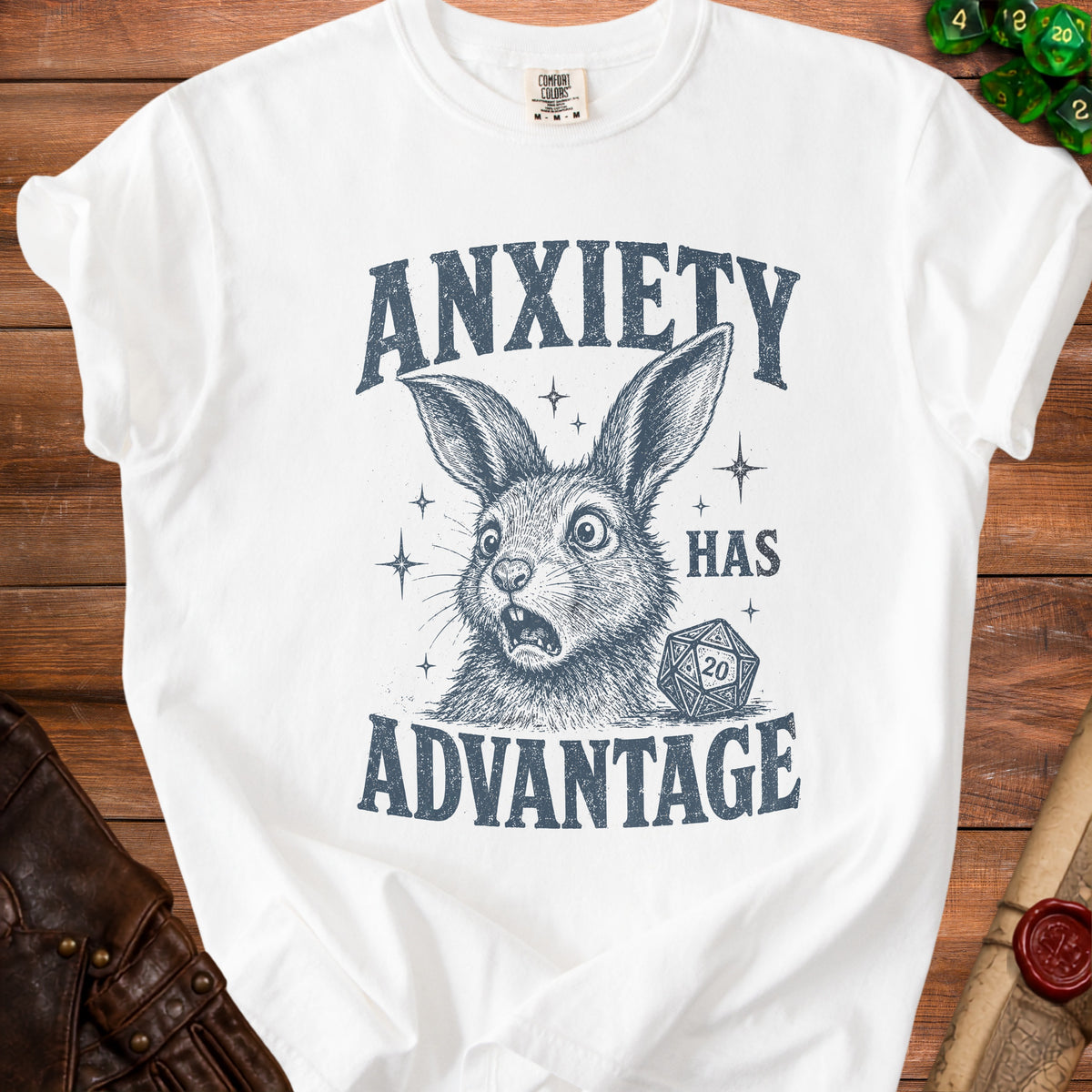 White t-shirt with distressed print: startled rabbit, d20 die, and text "ANXIETY HAS ADVANTAGE".