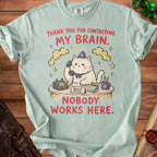 Light blue t-shirt graphic with a cat on the phone saying "Thank you for contacting my brain. Nobody works here."