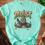 Mint t-shirt with a knight in armor sinking in water, sword and "moist" text.