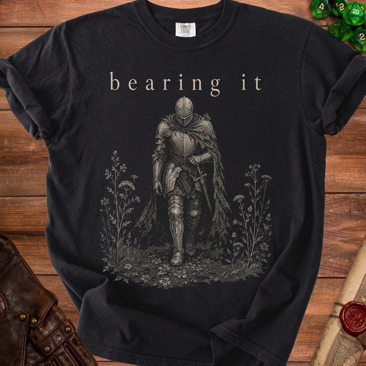 Black t-shirt with knight and text "bearing it" on a dark background.