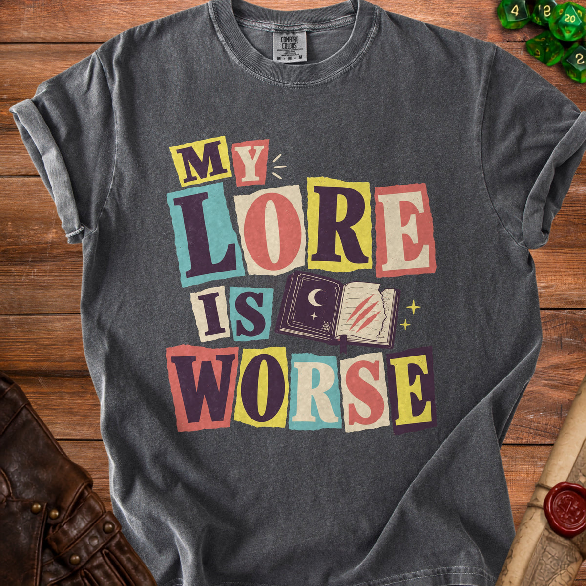 Charcoal t-shirt with "MY LORE IS WORSE" text and an open book graphic.
