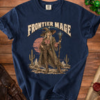 Frontier Mage graphic on a navy blue t-shirt featuring a desert scene with a wizard.