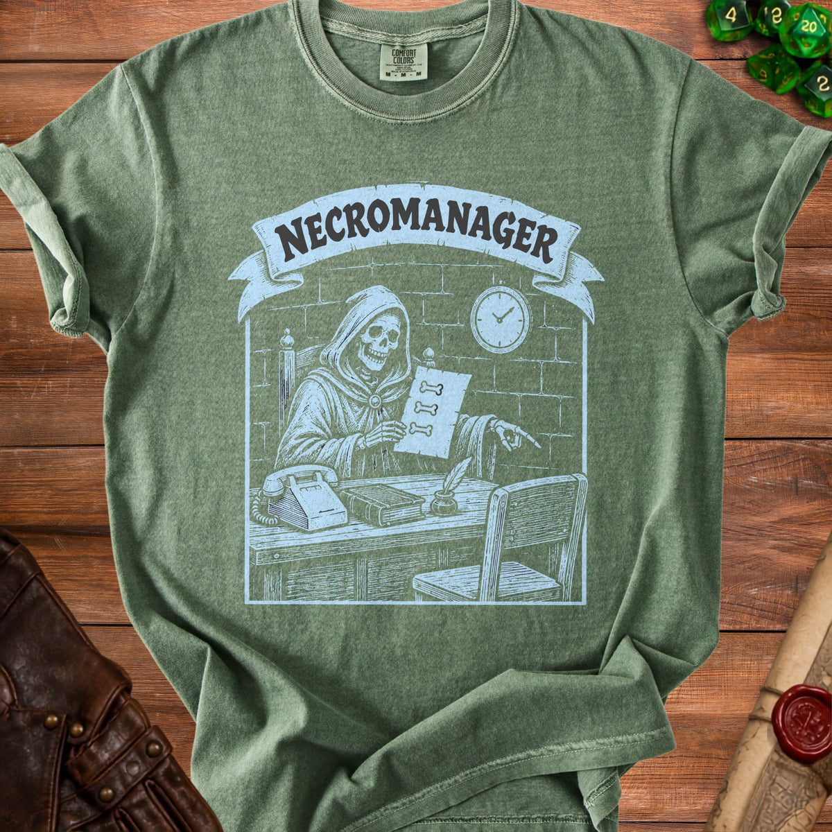 Green t-shirt with "NECROMANAGER" text and a skeleton in an office.
