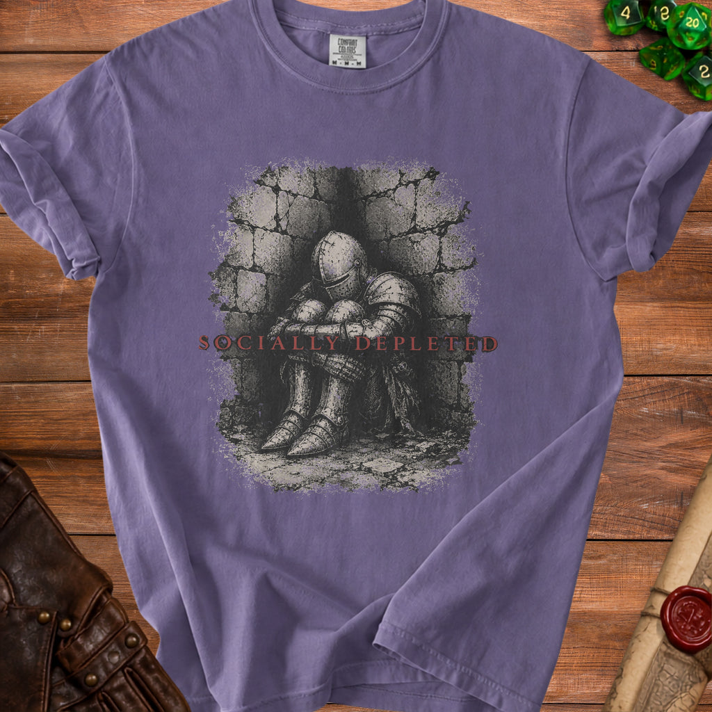 Purple t-shirt with a drawing of a knight in armor sitting in a stone wall, text "SOCIALLY DEPLETED".