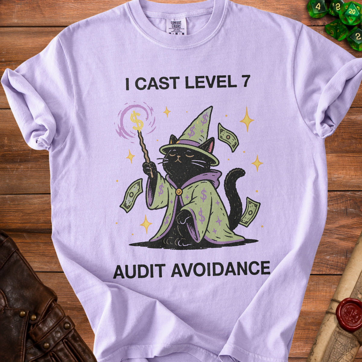 Light purple t-shirt with a black cat wizard and text "I CAST LEVEL 7 AUDIT AVOIDANCE".