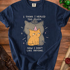 Navy t-shirt with cartoon cats and text "I THINK I HEALED TOO MUCH. NOW I DON'T LIKE ANYONE."