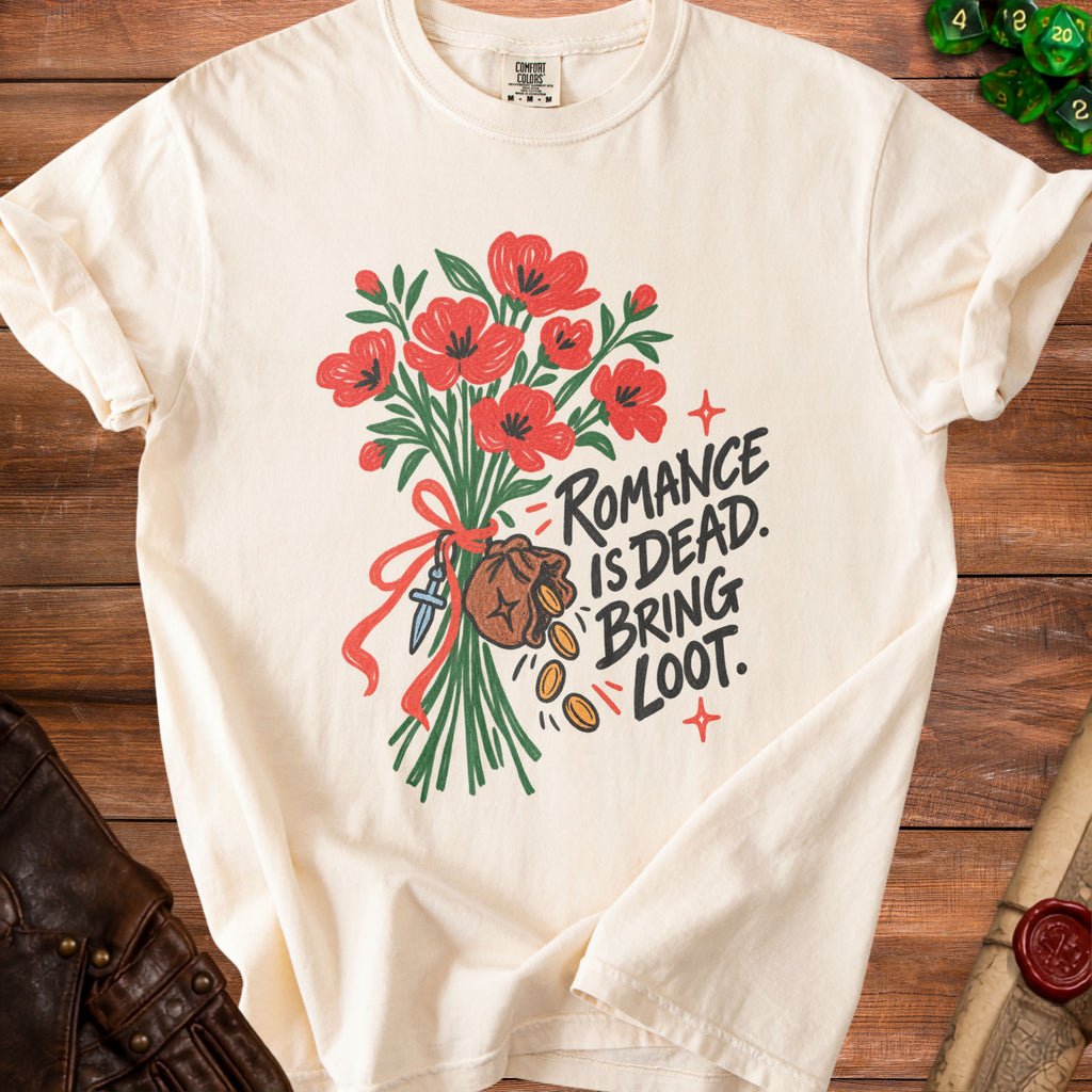 Cream t-shirt with bouquet graphic and text "Romance is dead. Bring loot."