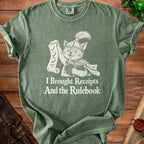 Green t-shirt with a cat wearing a helmet and holding a scroll and book with text "I Brought Receipts And the Rulebook".