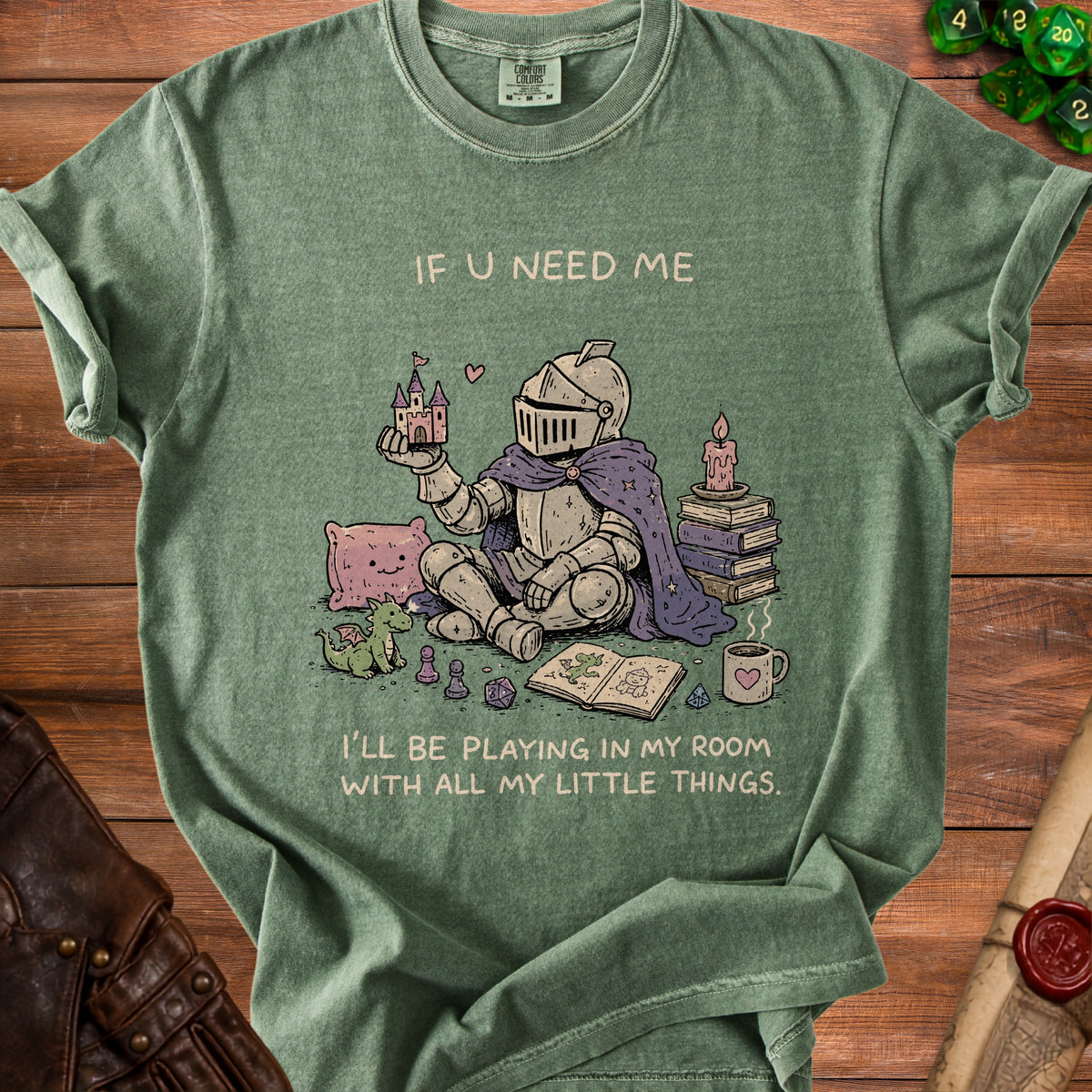 Green t-shirt with knight holding castle and text: "If u need me I'll be playing in my room with all my little things."