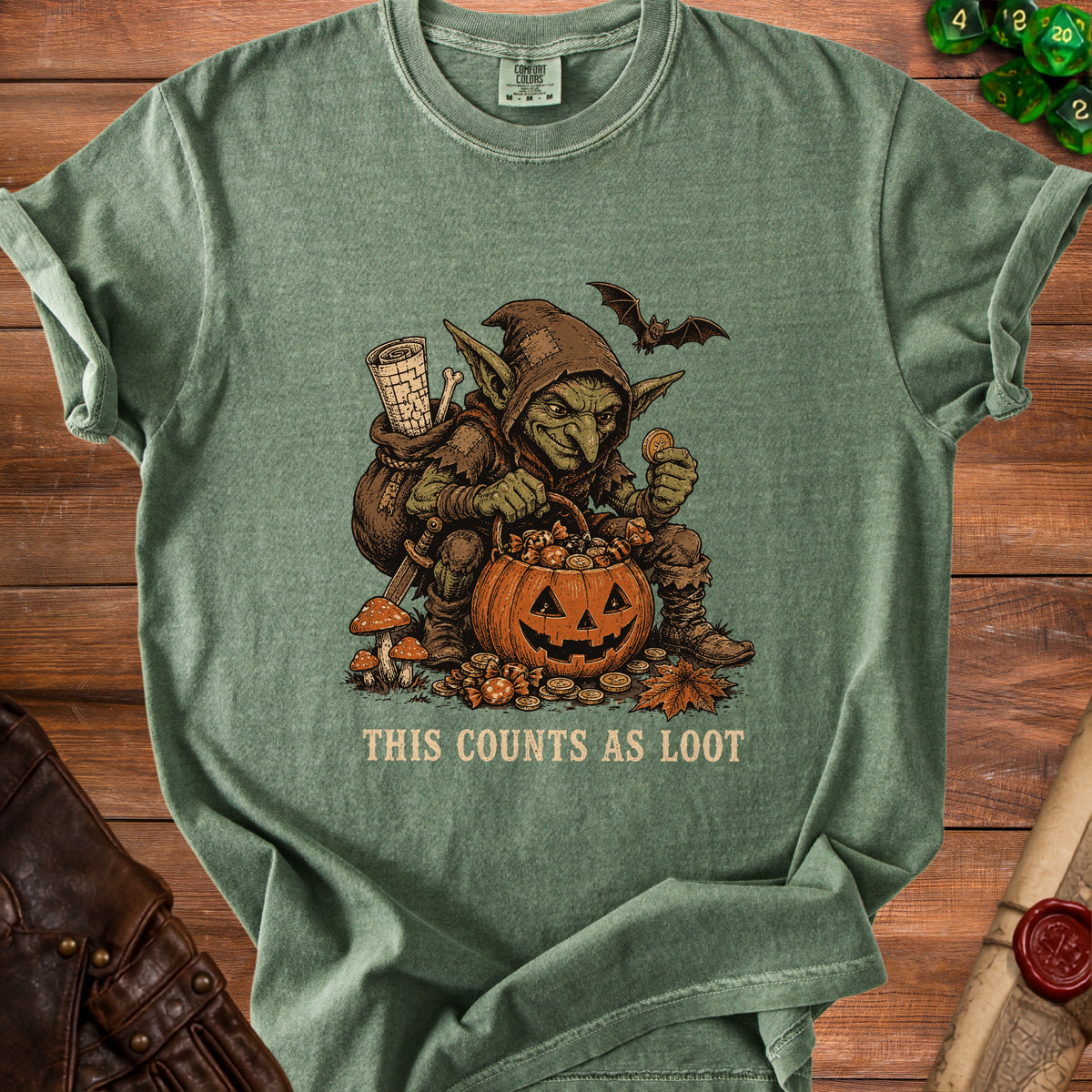 Goblin with a jack-o'-lantern bucket of candy and coins, text says "This Counts as Loot".