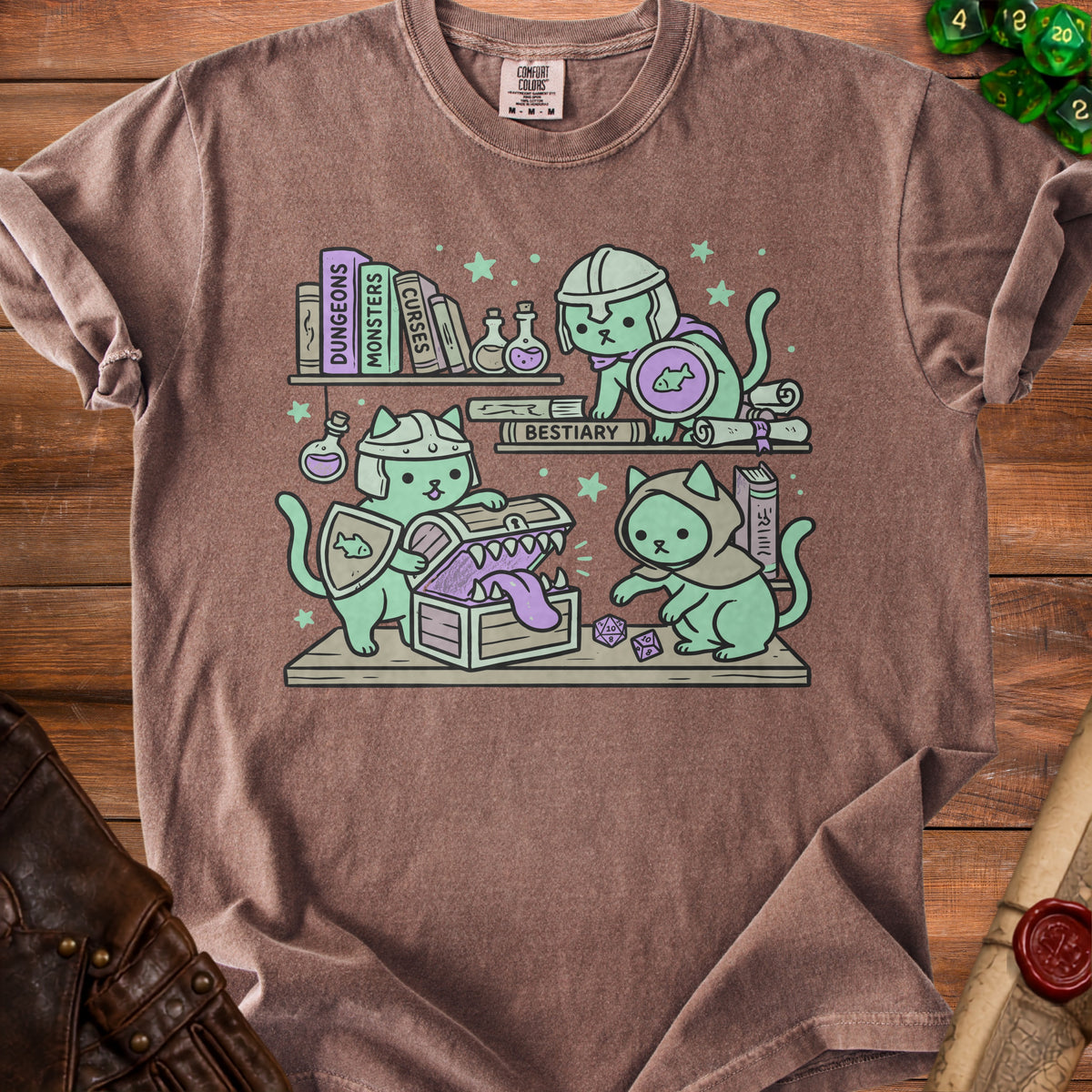 Cats in armor explore a treasure chest on a shelf with books titled "Dungeons," "Monsters," "Curses," and "Bestiary."