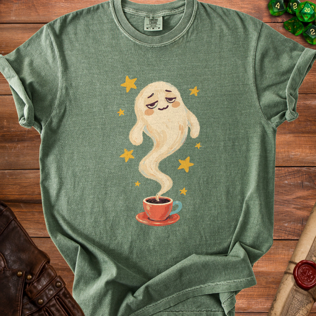 Ghost with steam from coffee cup surrounded by yellow stars on green t-shirt.